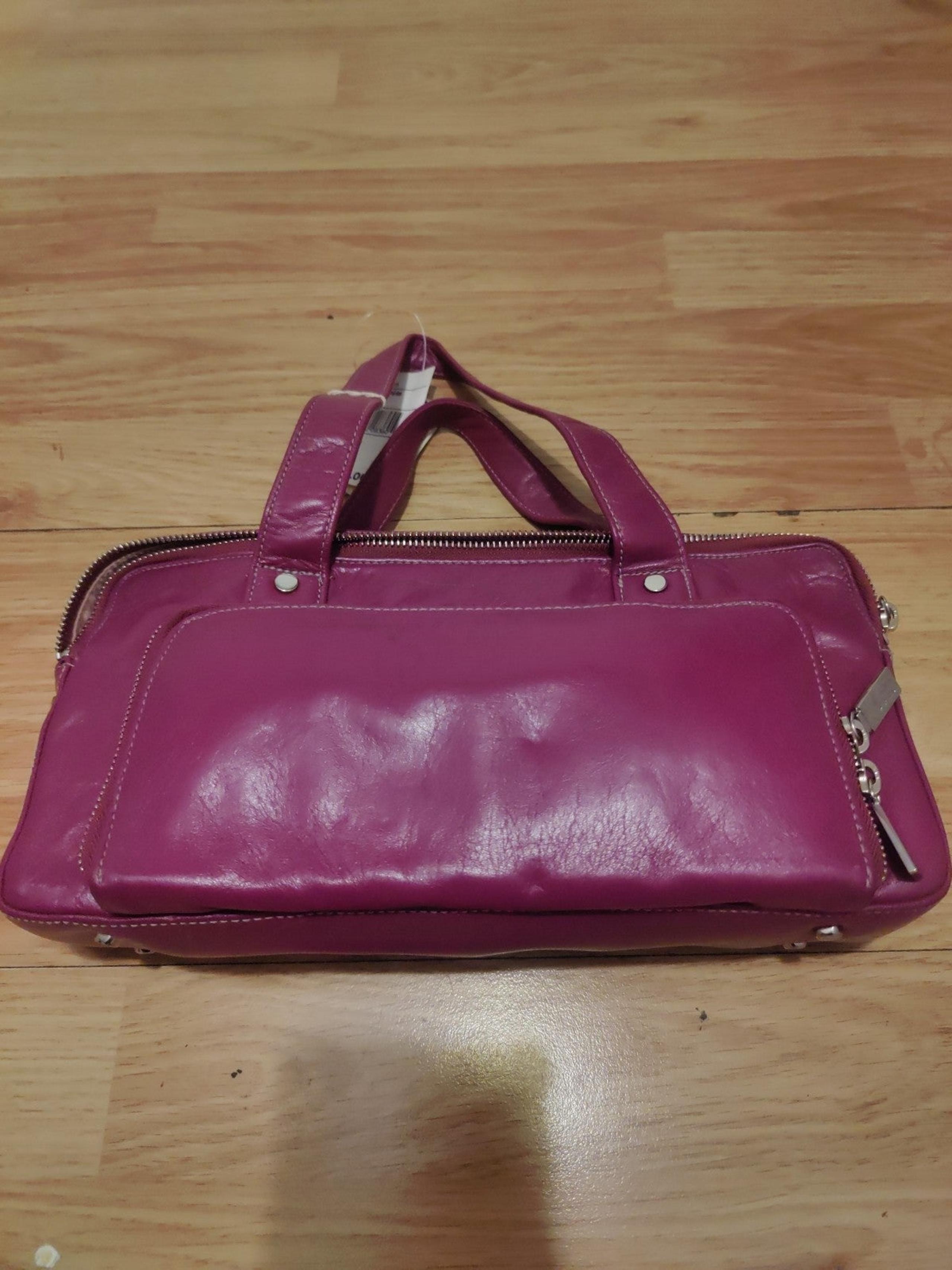 Perlina fushia hand bag 100% leather