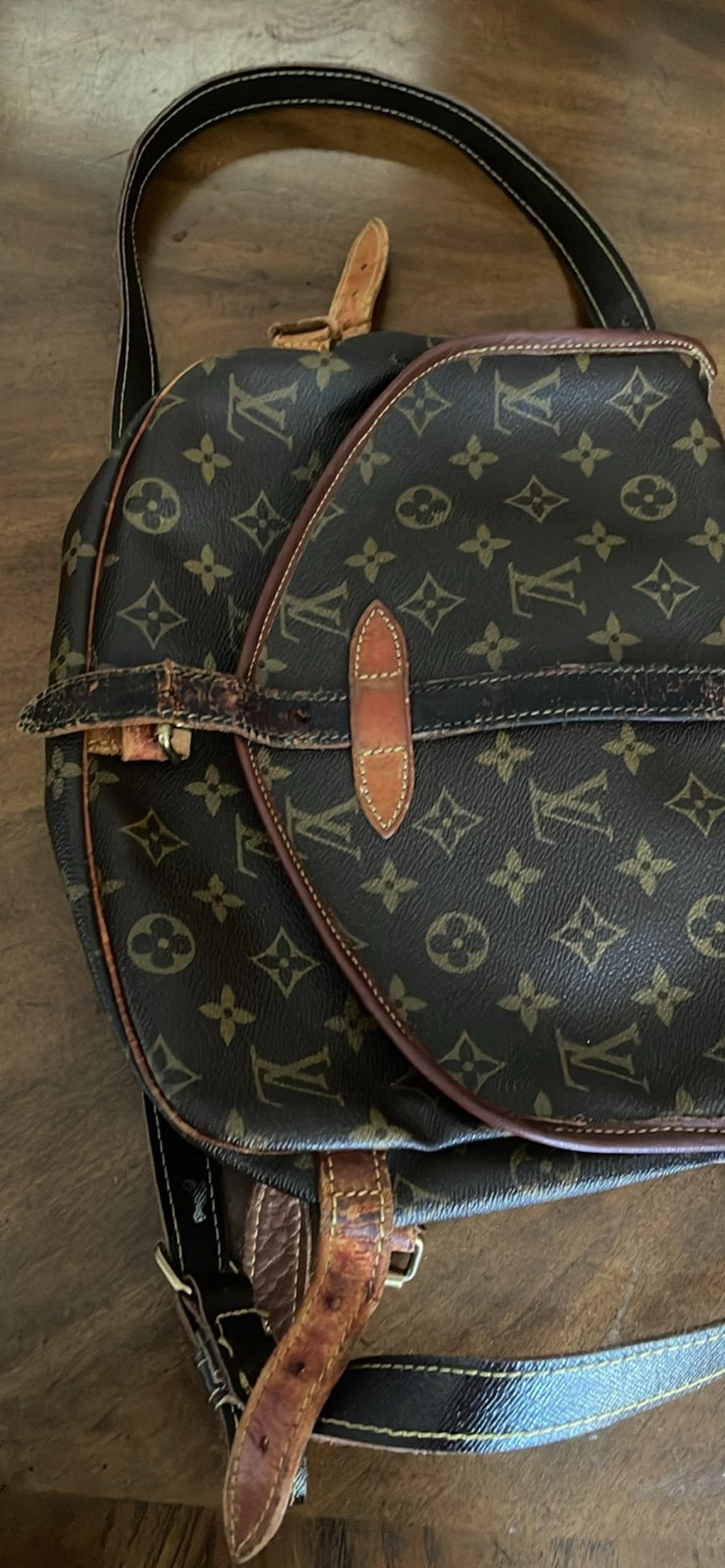 Louis Vuitton saumur crossbody bags as it is