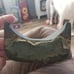 Iron fish watering spout