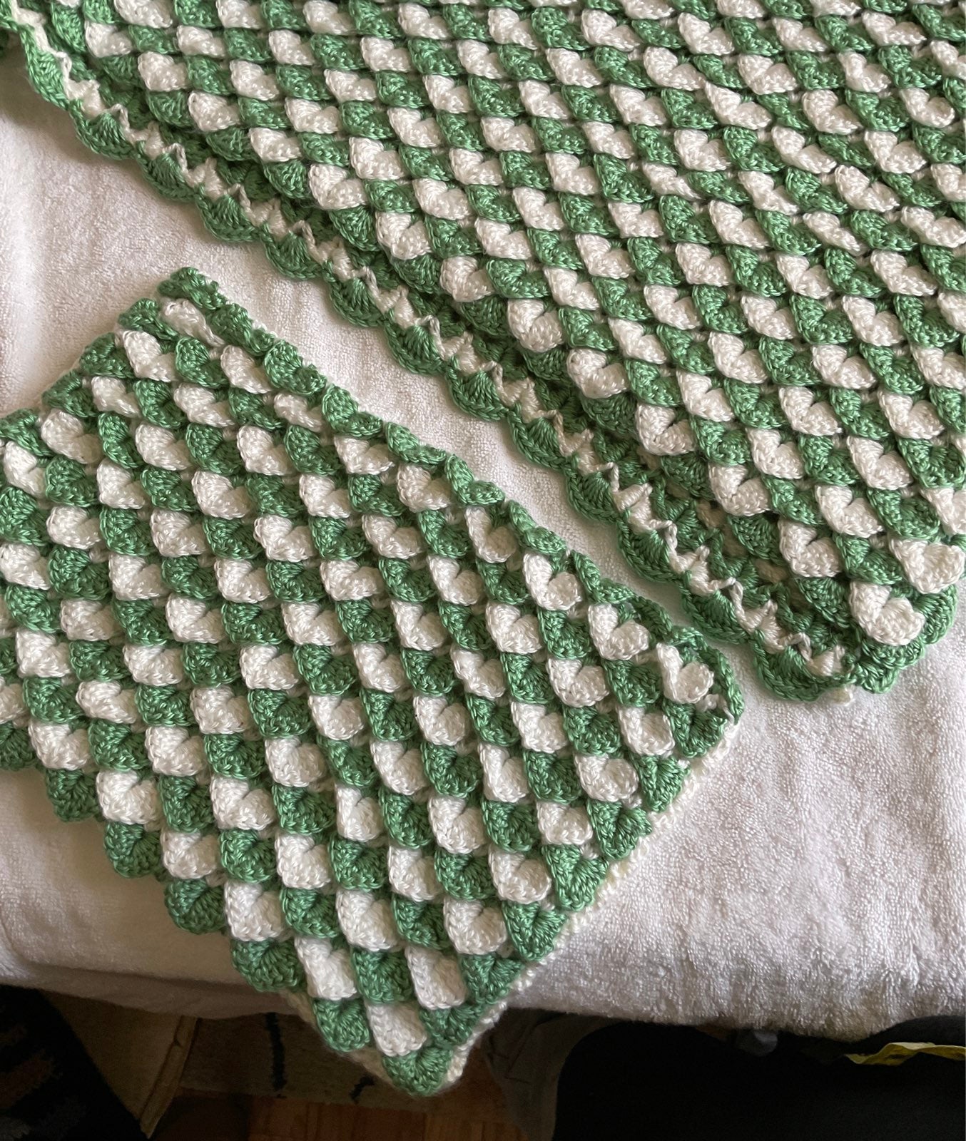Afghan with a pillow cover.