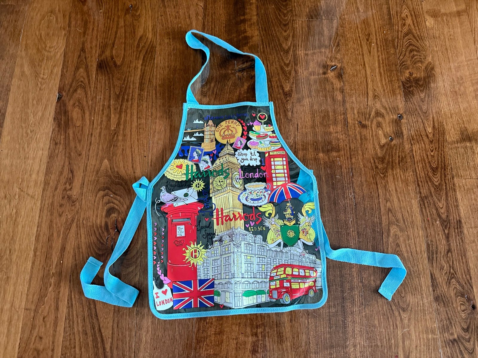 Kids Harrods apron London England landmarks