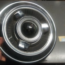One 1960s Dodge or Plymouth spinner hubcap 14