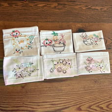 Set of six vintage tea towels.