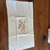 Set of six vintage tea towels.