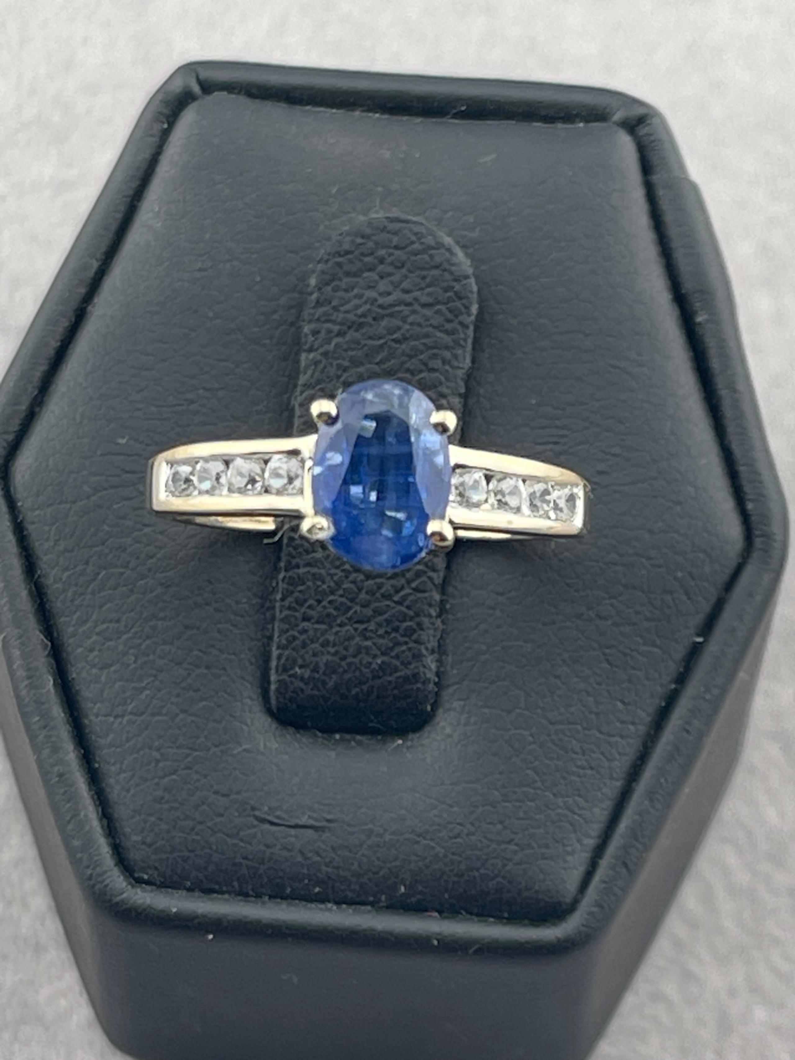 Vintages 1/2 carat sapphire, and 1/4 carat diamond ring 14 karat yellow gold