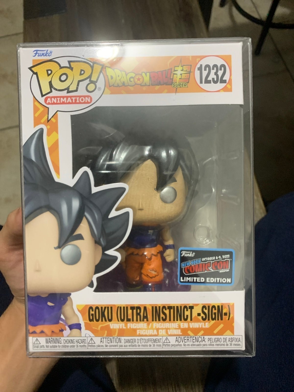 Comic con Goku ultra instinct sign