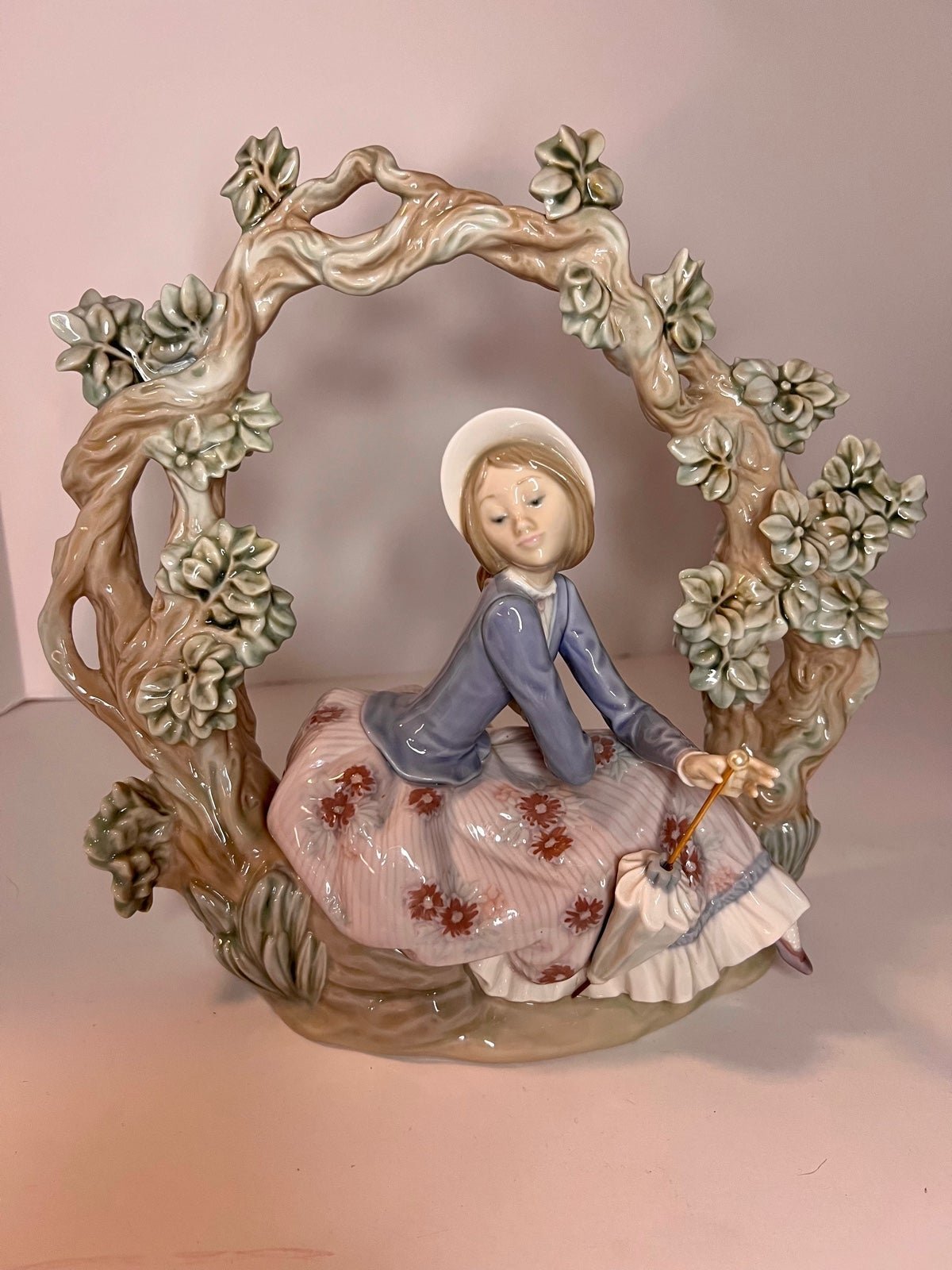Lladro #5298 “Girl sitting under trellis” 1985 by sculptor Jose Puche RARE