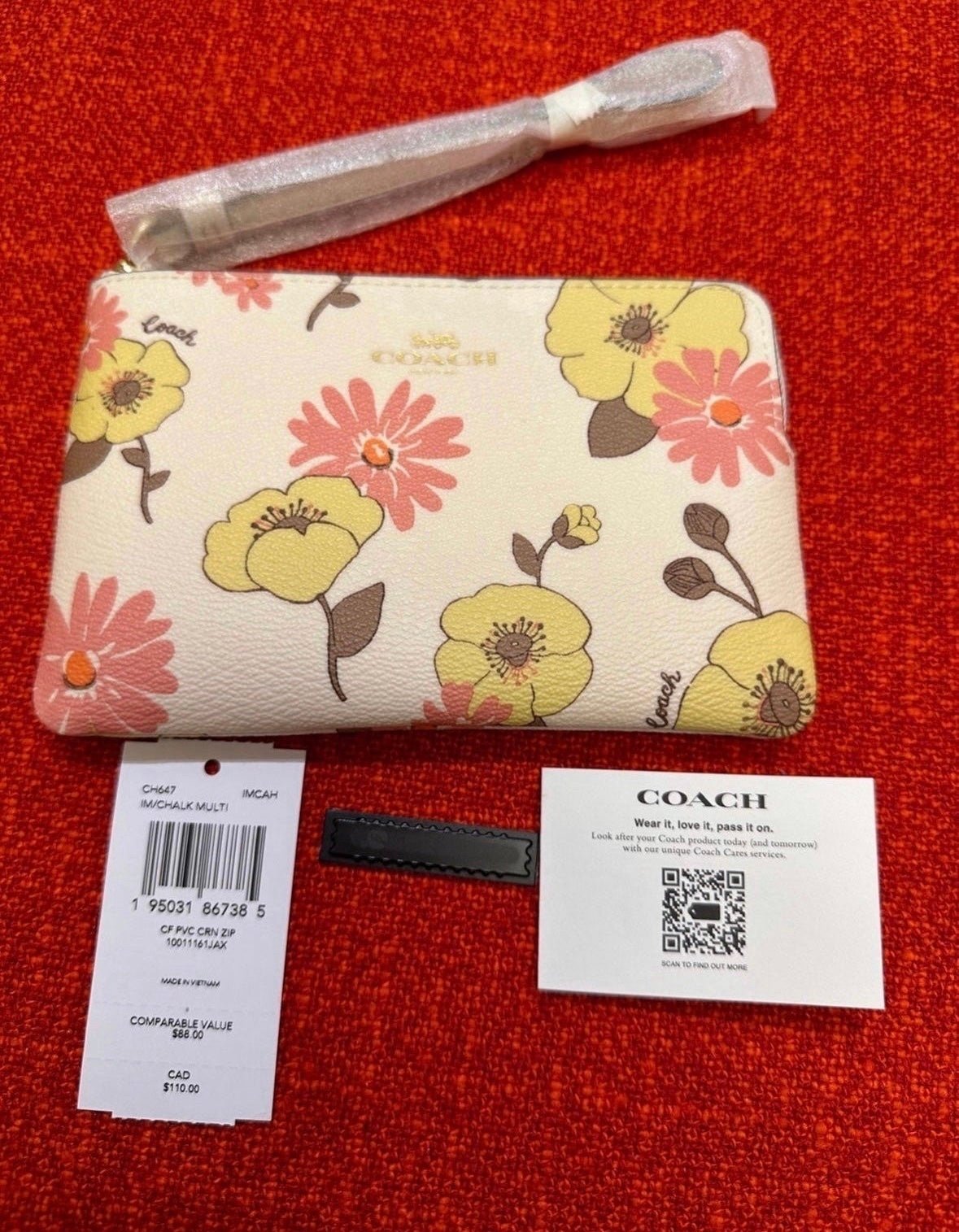NWT Coach Corner zip wristlet with floral print CH647