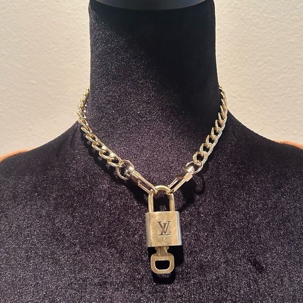 Louis Vuitton #311 Lock and Key Gold Brass with new