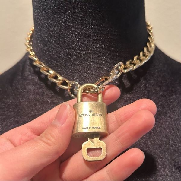 Louis Vuitton #311 Lock and Key Gold Brass with new