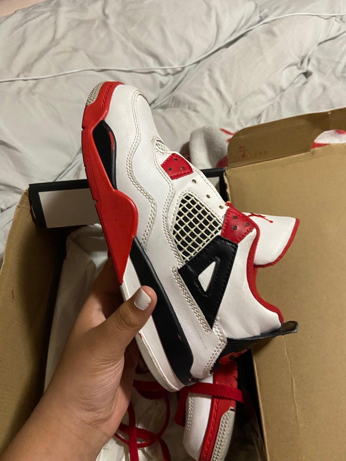 fire red Jordan 4