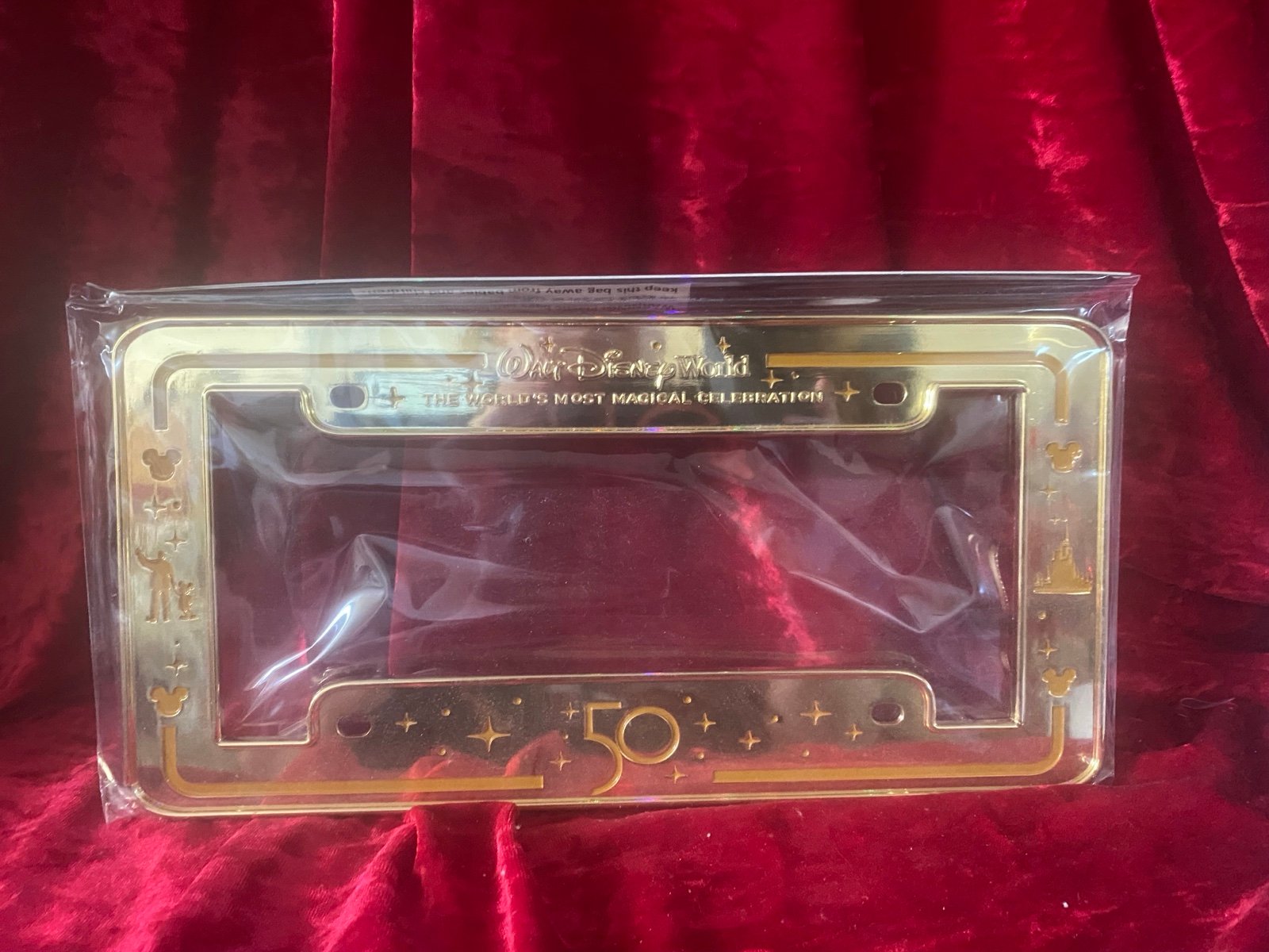Disney 50th celebration gold license plate frame