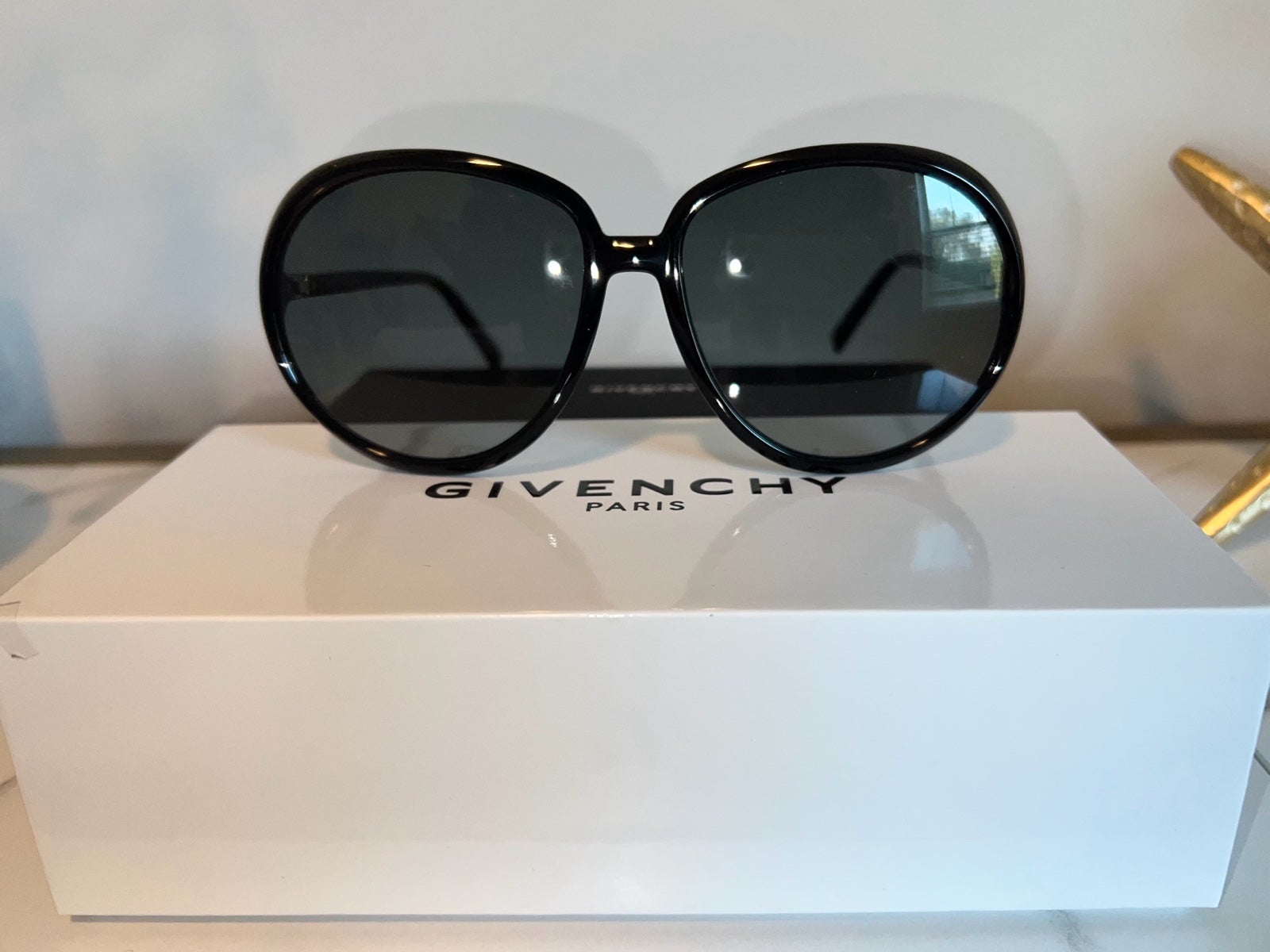 Chic Givenchy sunglasses. Brand new. Comes with dust cloth, case and box