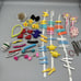 Vintage 1980s Girls Hair Clips Huge lot Flowers Words Scissors Bags Etc
