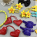 Vintage 1980s Girls Hair Clips Huge lot Flowers Words Scissors Bags Etc