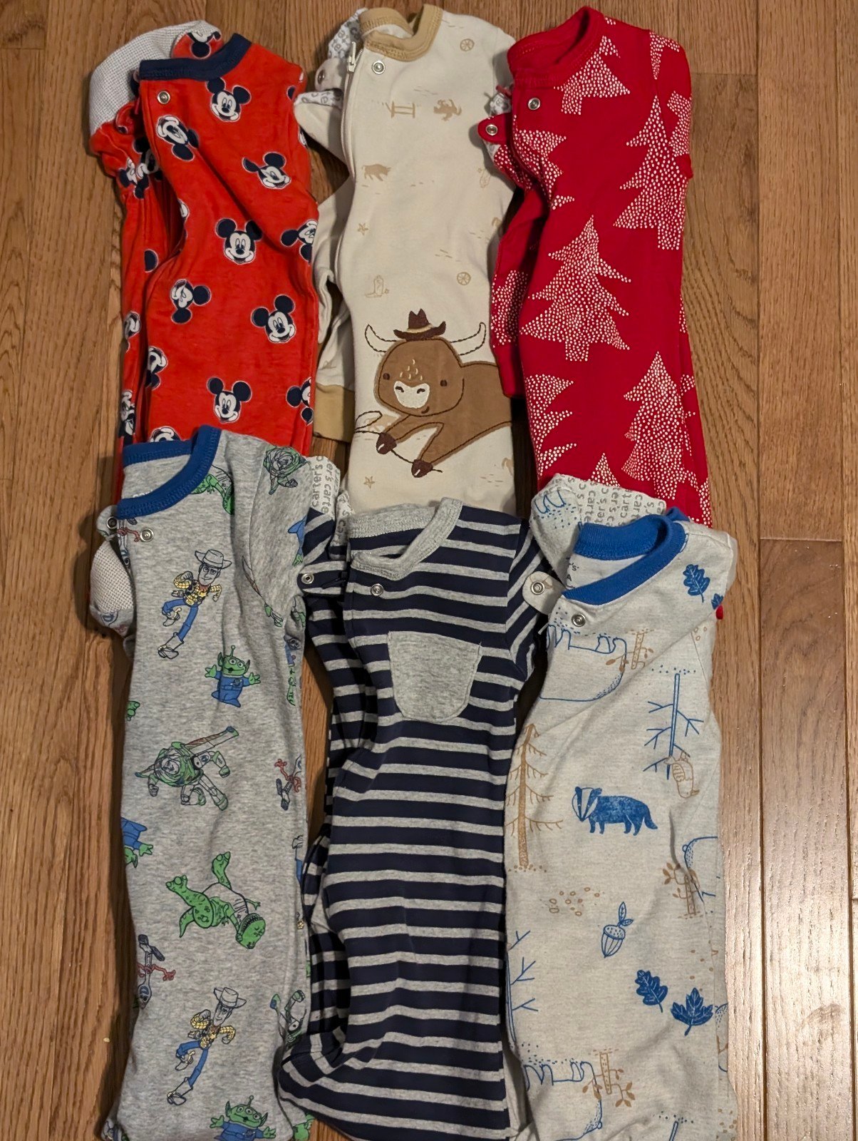 6 Carter's footed zip up pajamas