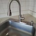 Pull down brushed steel sink faucet