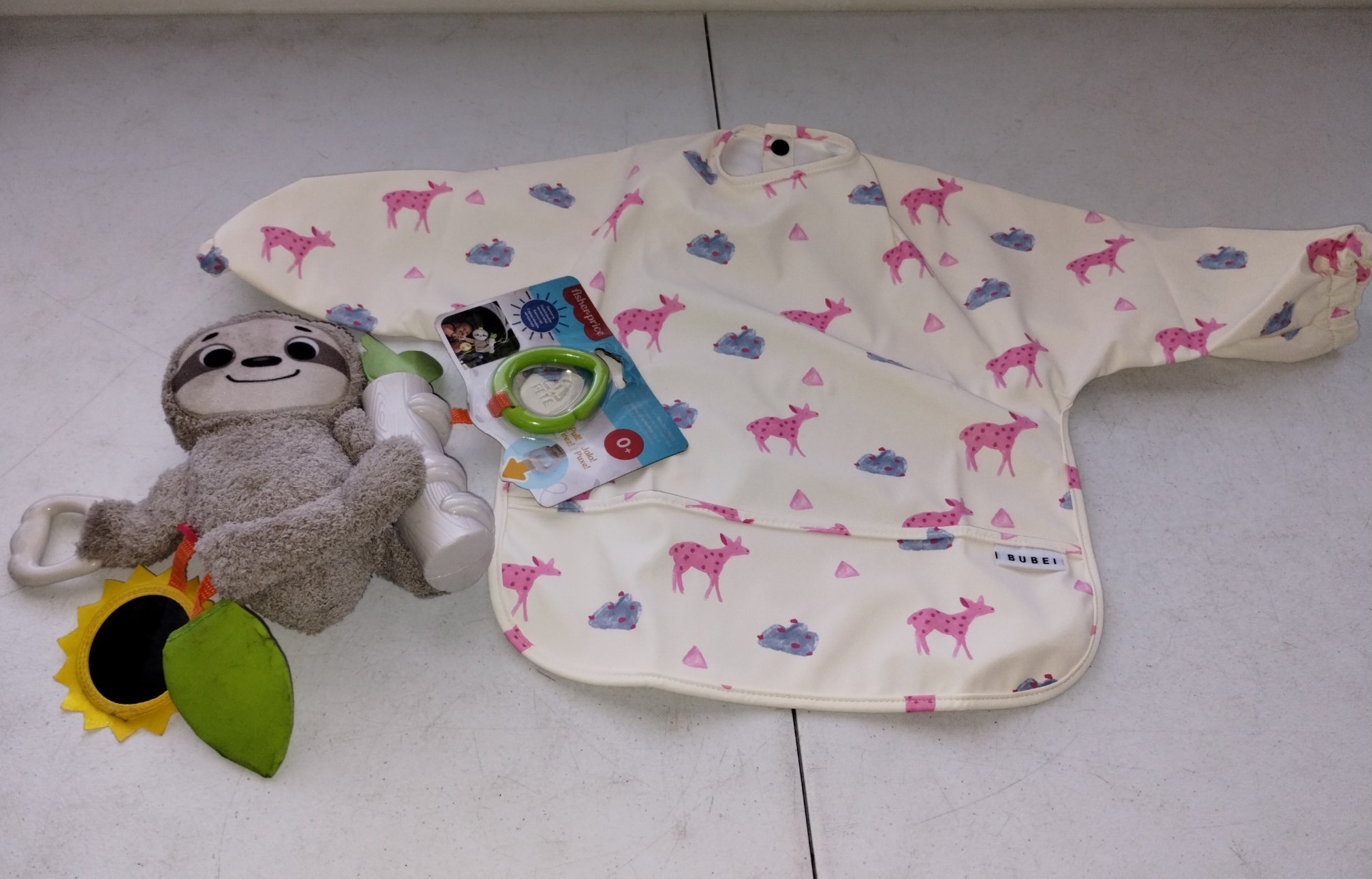 New Baby Essentials, Waterproof Bibbed Cape & Fisher Price Sloth Toy