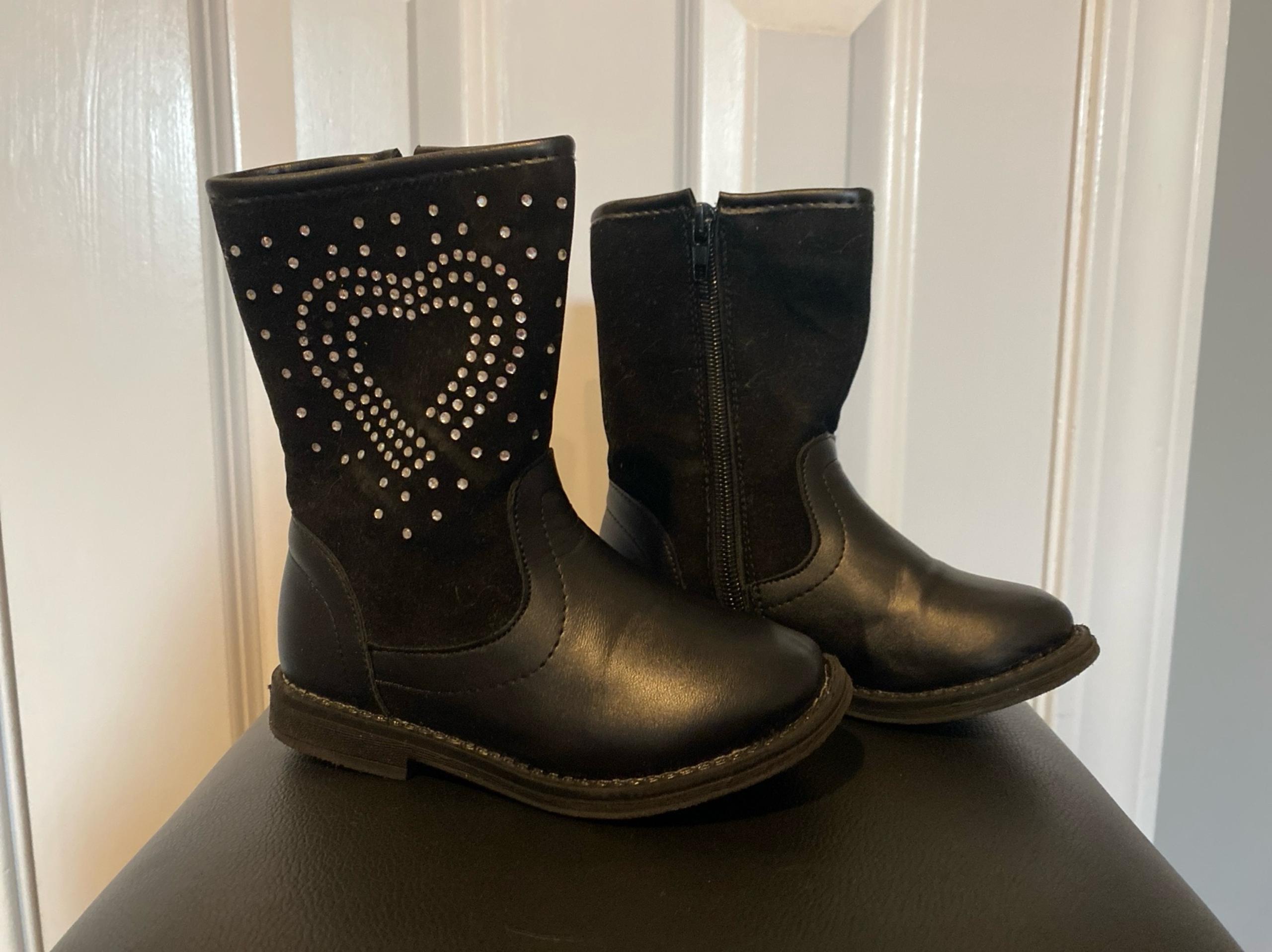 Black boots with heart rhinestones