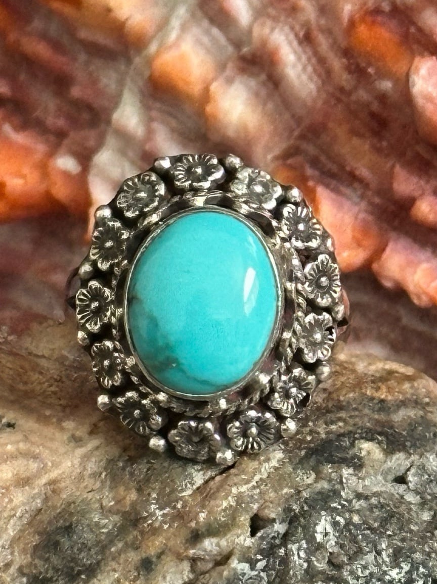 Turquoise with floral lei frame sterling silver ring