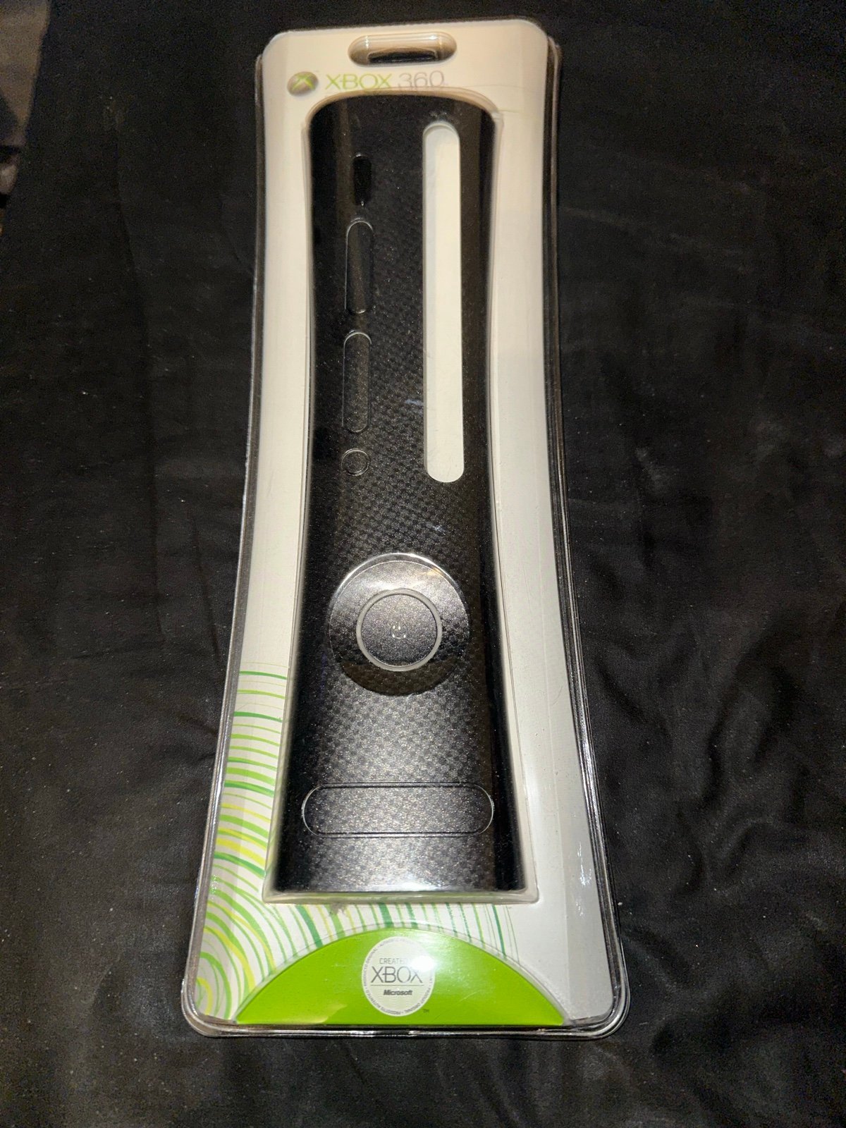 Xbox NOS carbon fiber face plate in original packaging great condition .