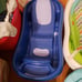 Numerous baby bath tubes and slings