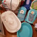 Numerous baby bath tubes and slings