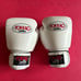 Set of Yokkao Matrix 16 ounce and 12 ounce Muay Thai boxing gloves