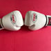 Set of Yokkao Matrix 16 ounce and 12 ounce Muay Thai boxing gloves
