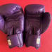 Set of Yokkao Matrix 16 ounce and 12 ounce Muay Thai boxing gloves