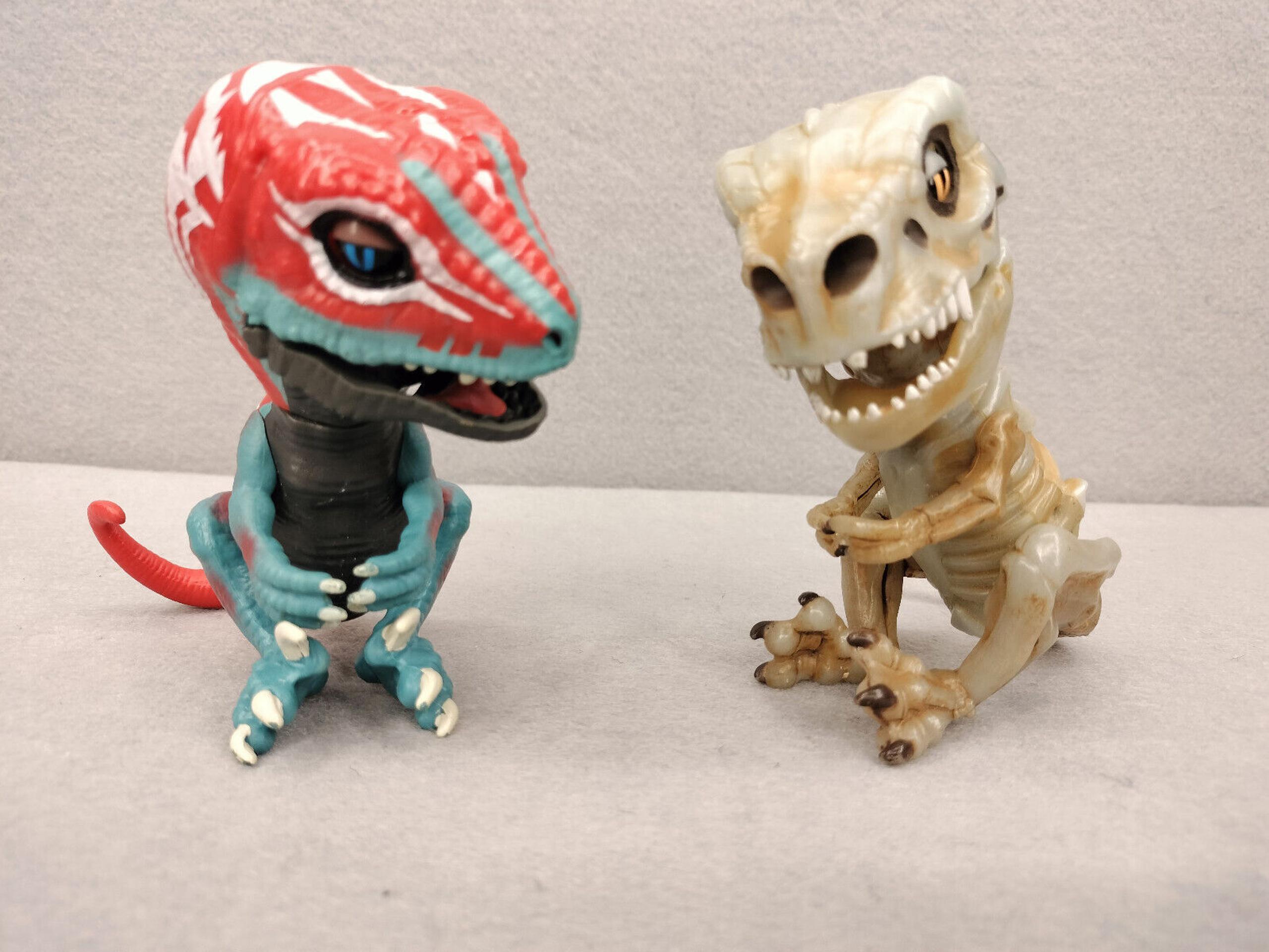 WowWee Untamed Fingerlings T-Rex Bonehead Skeleton & Velociraptor Doom Dinosaurs