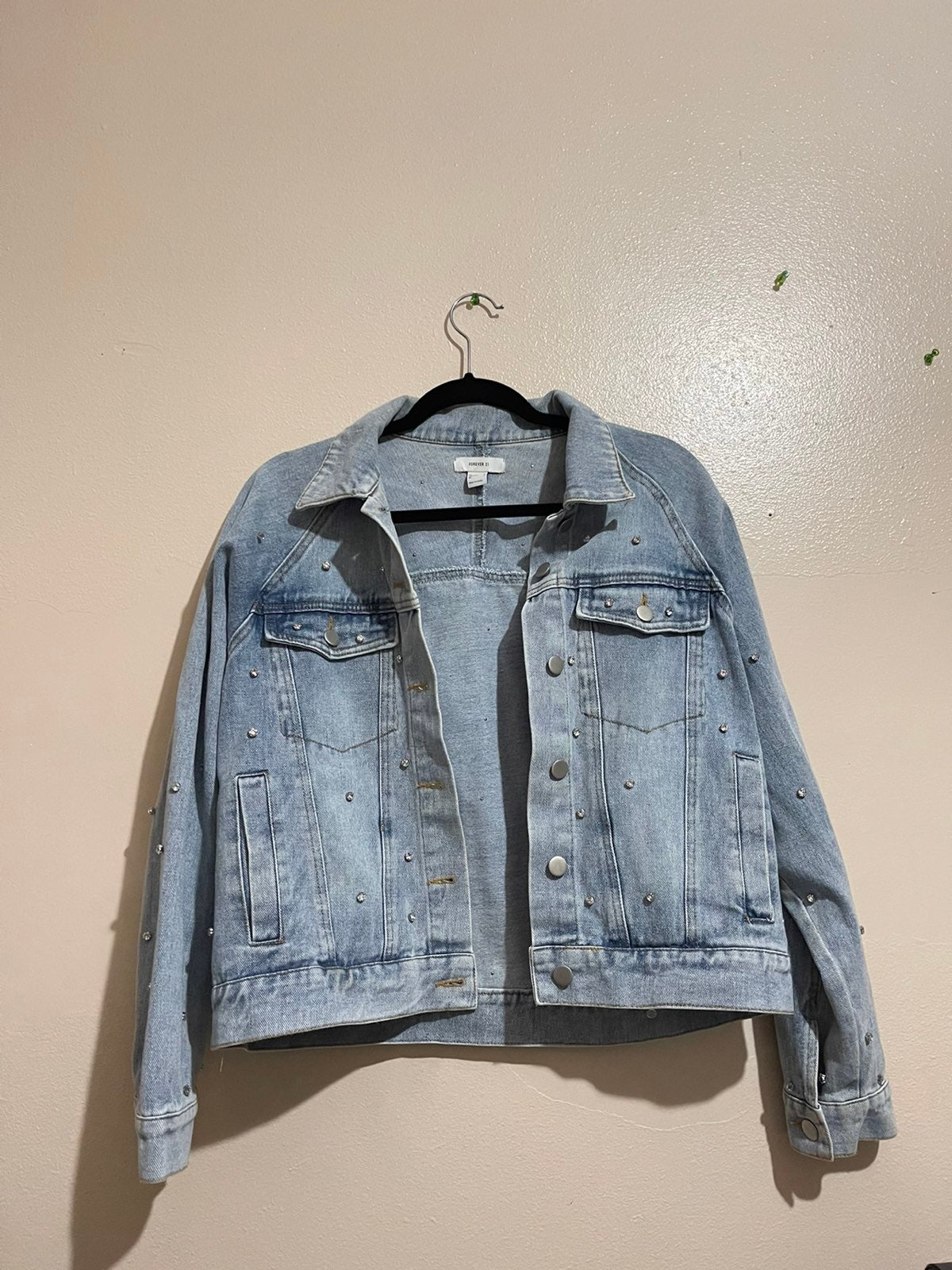 Denim jacket with sparkle studs