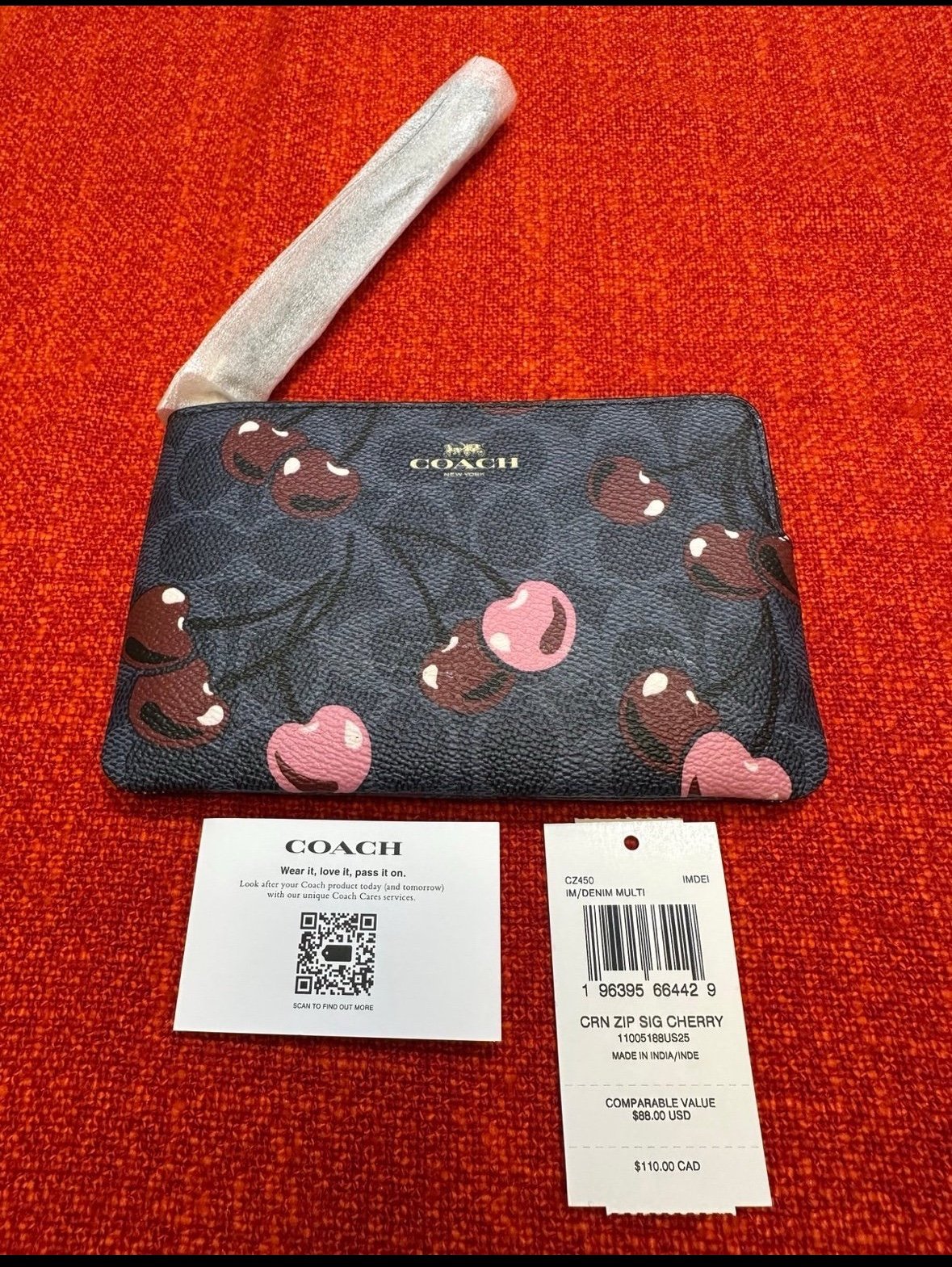 Coach Corner Zip Wristlet In Signature Canvas With Cherry Print CZ450
