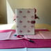COACH FLAMINGO NOTEBOOK