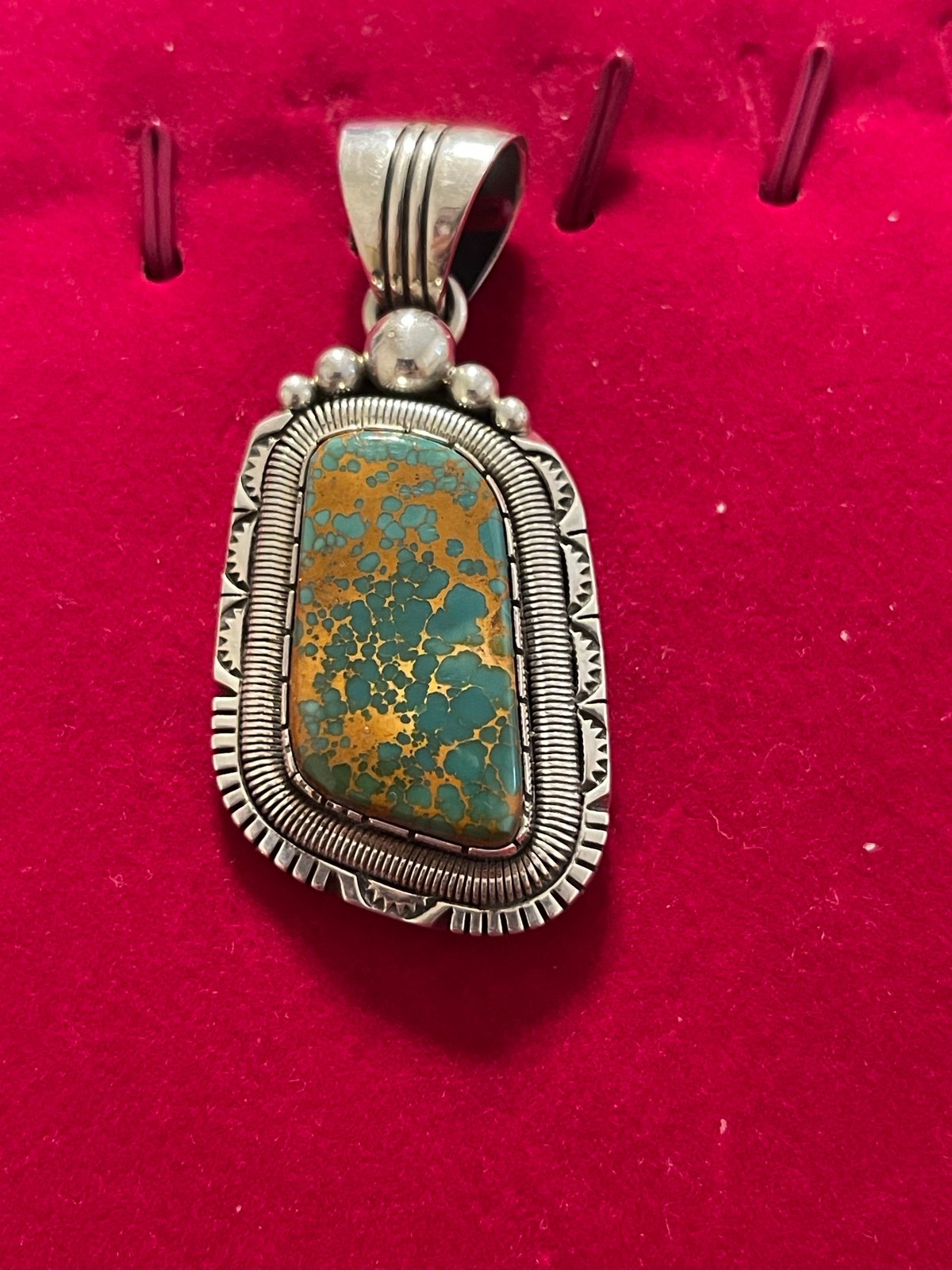 WCV stamped pendant