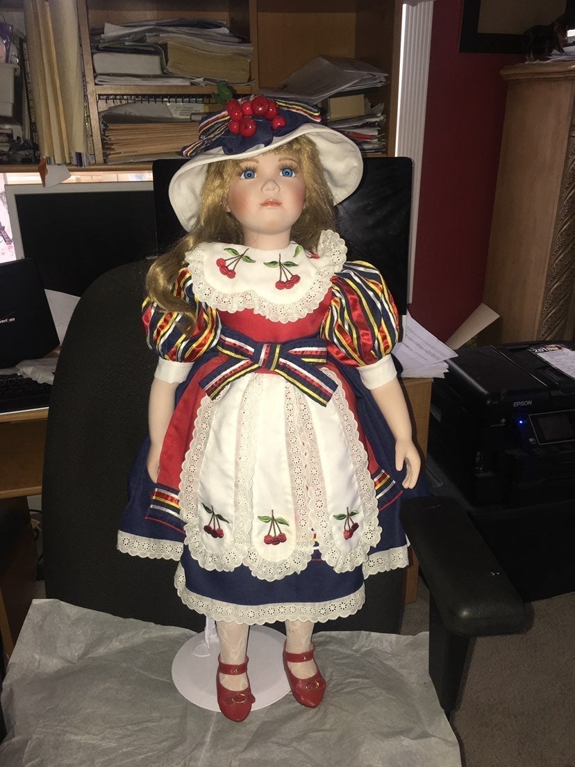 Porcelain doll 27 tall