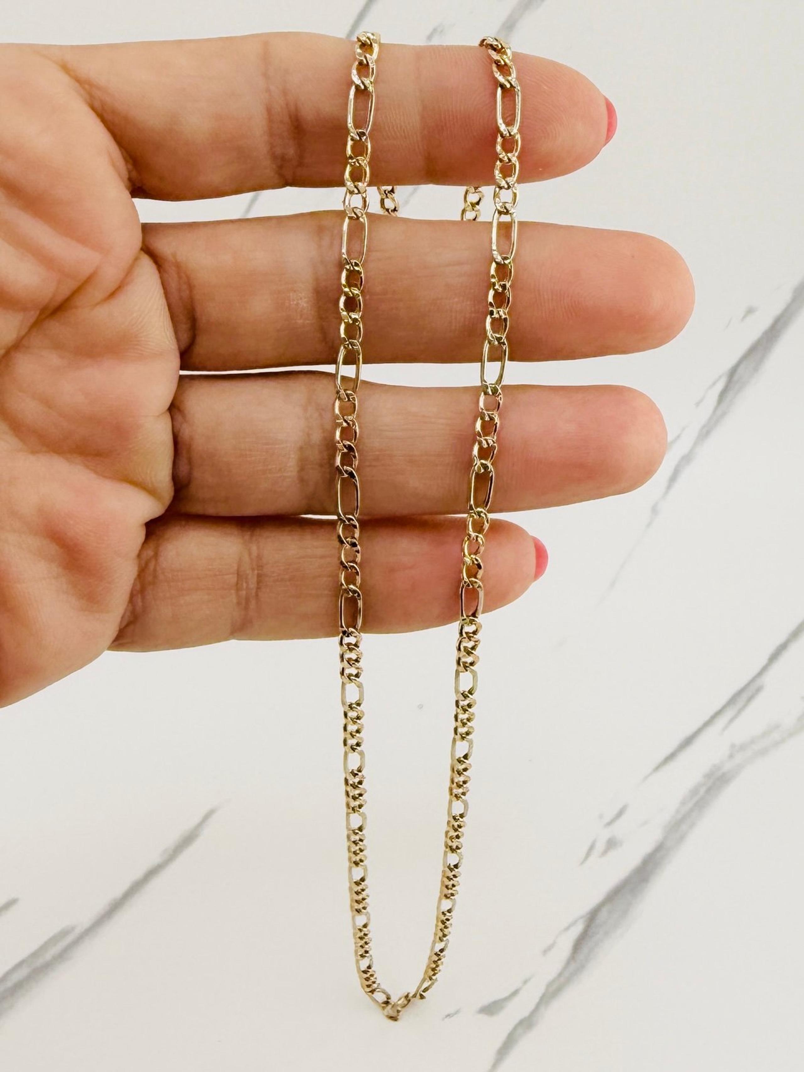 10k gold necklace 20” Figaro