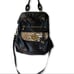 Emma Fox black leather satchel with floral interior and animal print accent