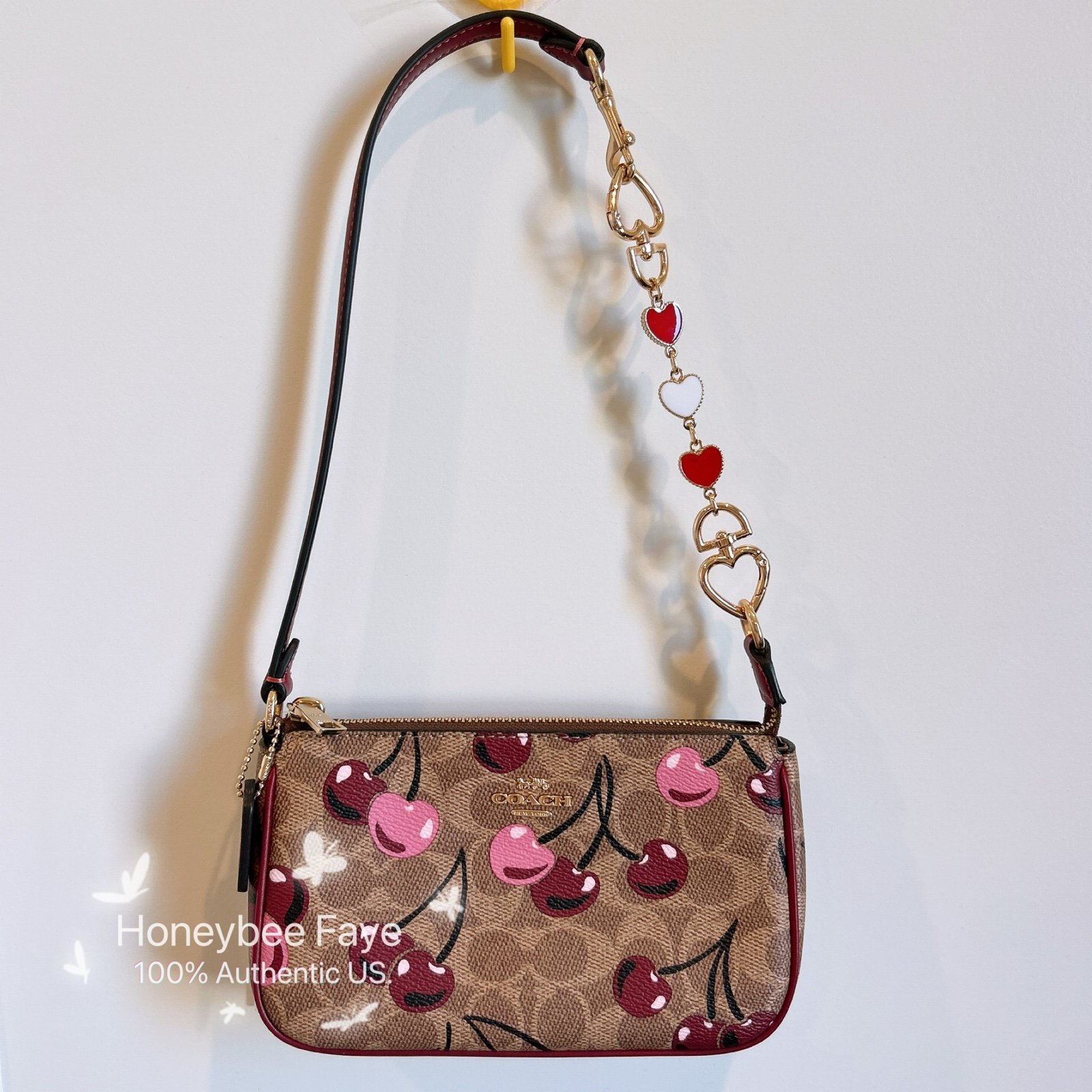 Nwt coach Nolita 19 with cherry print + chain