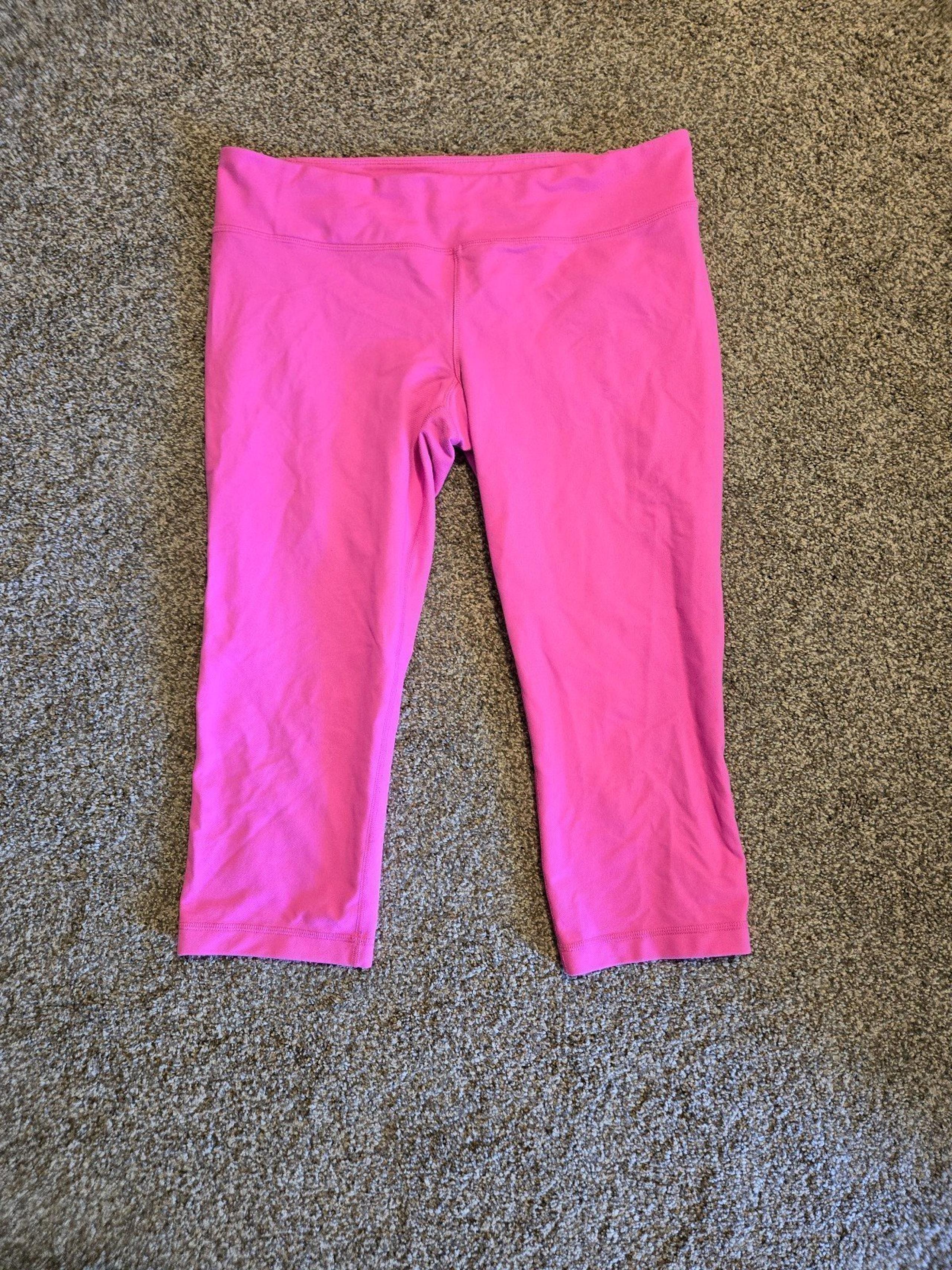 Women's Under Armour pink athletic leggings size large in great condition