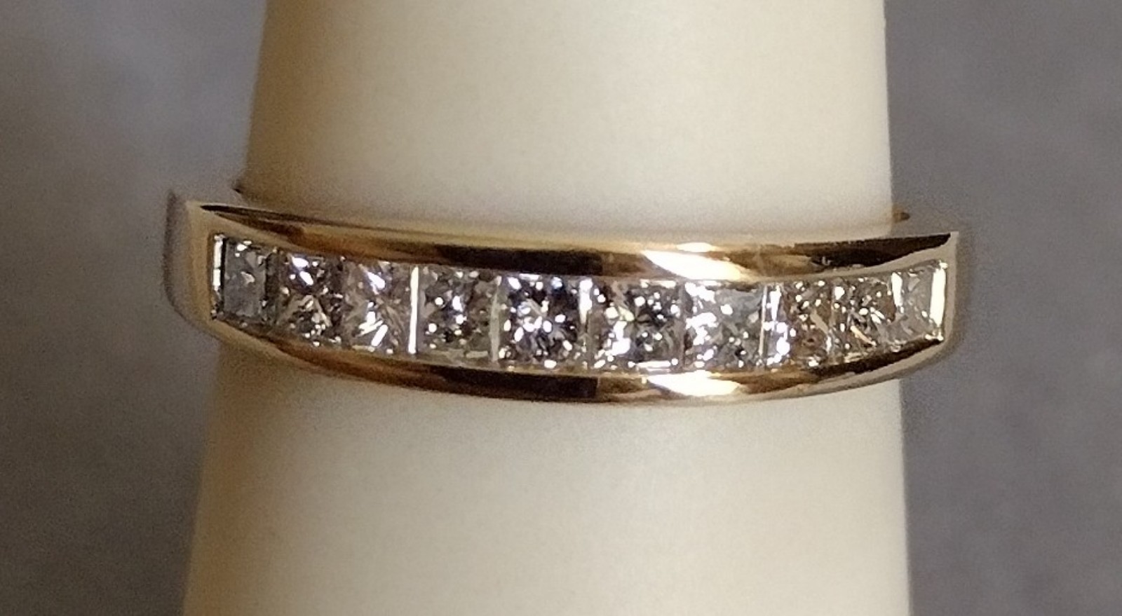 Princess cut Diamond wedding band ring in 14K yellow gold. 1/2 CTW. Size 5 3/4.
