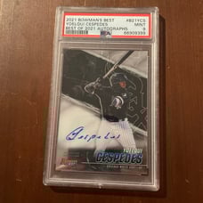 Yoelqui cespedes psa 9 auto graphed with a tiny crack in case.