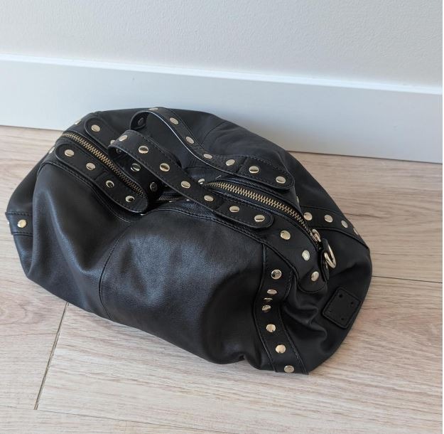 Black studded leather bag