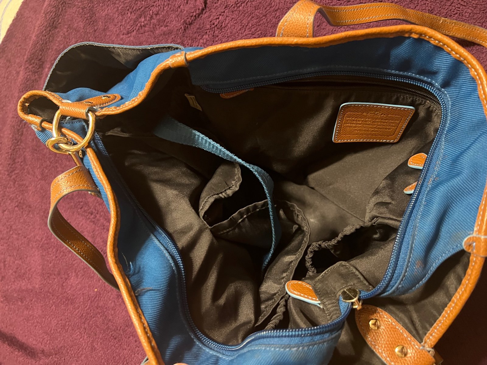 Blue and brown Coach Baby Bag