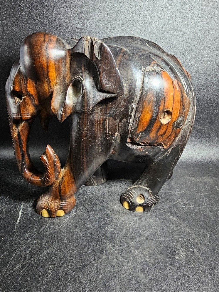 Vintage/antique hand carved Macassar ebony wooden figurine.