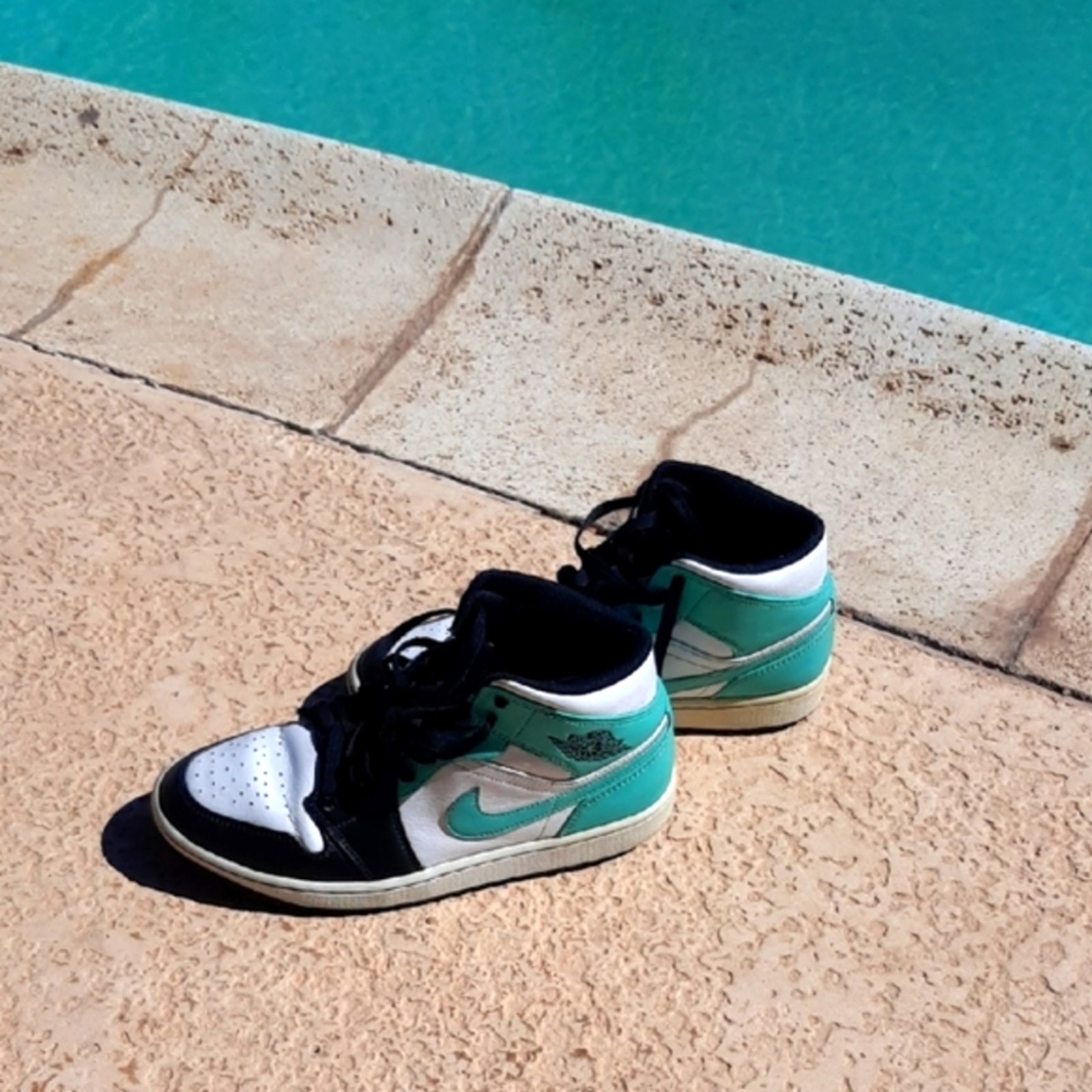 Nike Jordans 1 High-Top Sneakers in Black, White, and Teal. Originals