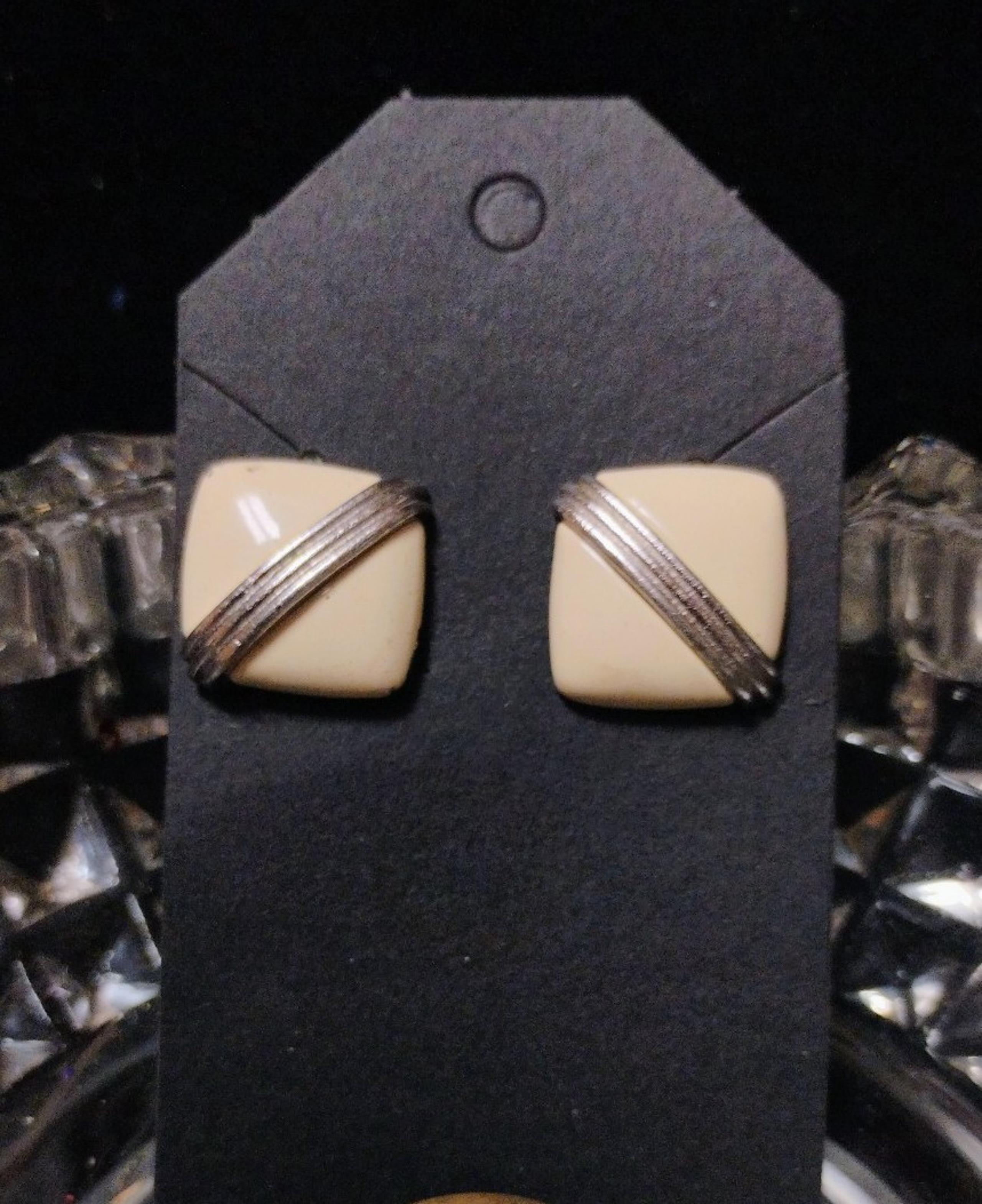 Small white and silver Clip Ons by Monet