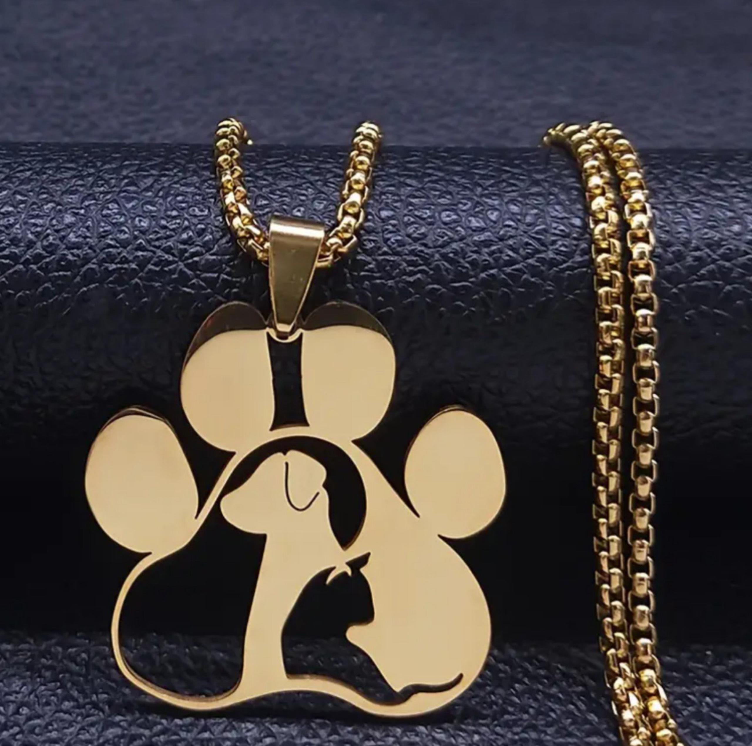 Whimsical paw print carved out necklaces, 22", black, gold, silver. 316L