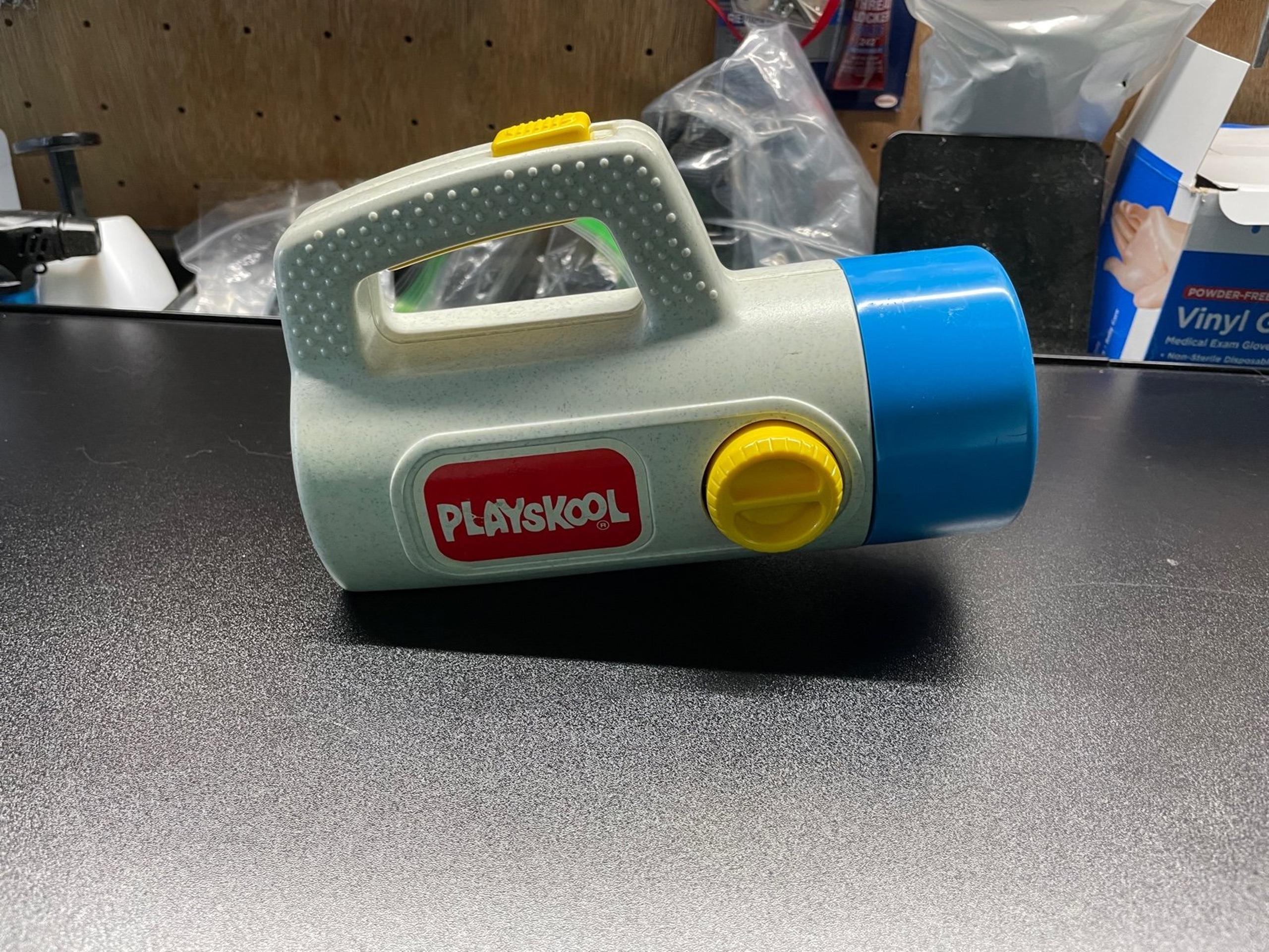 Playskool spotlight with red/green shades