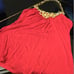 Red halter top with chain detail.